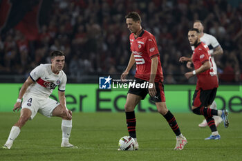 2023-10-08 - Nemanja Matic of Rennes, left Manuel Ugarte of PSG during the French championship Ligue 1 football match between Stade Rennais (Rennes) and Paris Saint-Germain on October 8, 2023 at Roazhon Park in Rennes, France - FOOTBALL - FRENCH CHAMP - RENNES V PARIS SG - FRENCH LIGUE 1 - SOCCER