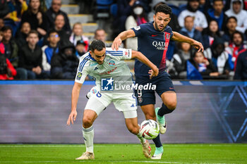 2023-10-21 - Lucas PERRIN of Strasbourg and Goncalo RAMOS of PSG during the French championship Ligue 1 football match between Paris Saint-Germain and RC Strasbourg on October 21, 2023 at Parc des Princes stadium in Paris, France - FOOTBALL - FRENCH CHAMP - PARIS SG V STRASBOURG - FRENCH LIGUE 1 - SOCCER