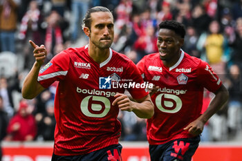 2023-10-22 - Yusuf YAZICI of Lille celebrate his goal with Jonathan DAVID of Lille during the French championship Ligue 1 football match between Losc Lille and Stade Brestois (Brest) on October 22, 2023 at Pierre Mauroy stadium in Villeneuve-d'Ascq near Lille, France - FOOTBALL - FRENCH CHAMP - LILLE V BREST - FRENCH LIGUE 1 - SOCCER