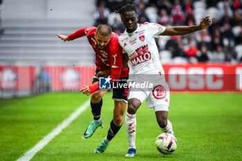 2023-10-22 - Edon ZHEGROVA of Lille and Bradley LOCKO of Brest during the French championship Ligue 1 football match between Losc Lille and Stade Brestois (Brest) on October 22, 2023 at Pierre Mauroy stadium in Villeneuve-d'Ascq near Lille, France - FOOTBALL - FRENCH CHAMP - LILLE V BREST - FRENCH LIGUE 1 - SOCCER