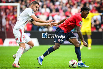 2023-10-22 - Brendan CHARDONNET of Brest and Jonathan DAVID of Lille during the French championship Ligue 1 football match between Losc Lille and Stade Brestois (Brest) on October 22, 2023 at Pierre Mauroy stadium in Villeneuve-d'Ascq near Lille, France - FOOTBALL - FRENCH CHAMP - LILLE V BREST - FRENCH LIGUE 1 - SOCCER
