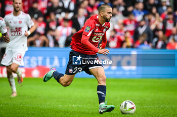2023-10-22 - Edon ZHEGROVA of Lille during the French championship Ligue 1 football match between Losc Lille and Stade Brestois (Brest) on October 22, 2023 at Pierre Mauroy stadium in Villeneuve-d'Ascq near Lille, France - FOOTBALL - FRENCH CHAMP - LILLE V BREST - FRENCH LIGUE 1 - SOCCER