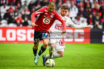 2023-10-22 - Edon ZHEGROVA of Lille and Hugo MAGNETTI of Brest during the French championship Ligue 1 football match between Losc Lille and Stade Brestois (Brest) on October 22, 2023 at Pierre Mauroy stadium in Villeneuve-d'Ascq near Lille, France - FOOTBALL - FRENCH CHAMP - LILLE V BREST - FRENCH LIGUE 1 - SOCCER