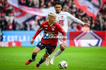 2023-10-22 - Hakon ARNAR HARALDSSON of Lille and Kenny LALA of Brest during the French championship Ligue 1 football match between Losc Lille and Stade Brestois (Brest) on October 22, 2023 at Pierre Mauroy stadium in Villeneuve-d'Ascq near Lille, France - FOOTBALL - FRENCH CHAMP - LILLE V BREST - FRENCH LIGUE 1 - SOCCER