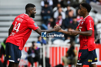 2023-10-22 - Samuel UMTITI of Lille and Jonathan DAVID of Lille during the French championship Ligue 1 football match between Losc Lille and Stade Brestois (Brest) on October 22, 2023 at Pierre Mauroy stadium in Villeneuve-d'Ascq near Lille, France - FOOTBALL - FRENCH CHAMP - LILLE V BREST - FRENCH LIGUE 1 - SOCCER