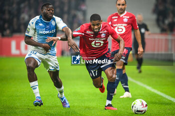 2023-10-29 - Youssouf FOFANA of Monaco and Ivan CAVALEIRO of Lille during the French championship Ligue 1 football match between Losc Lille and AS Monaco on October 29, 2023 at Pierre Mauroy stadium in Villeneuve-d'Ascq near Lille, France - FOOTBALL - FRENCH CHAMP - LILLE V MONACO - FRENCH LIGUE 1 - SOCCER