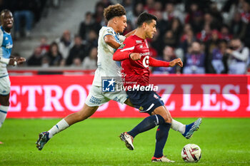 2023-10-29 - Eliesse BEN SEGHIR of Monaco and Benjamin ANDRE of Lille during the French championship Ligue 1 football match between Losc Lille and AS Monaco on October 29, 2023 at Pierre Mauroy stadium in Villeneuve-d'Ascq near Lille, France - FOOTBALL - FRENCH CHAMP - LILLE V MONACO - FRENCH LIGUE 1 - SOCCER