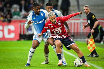 2023-10-29 - Myron BOADU of Monaco and Adam OUNAS of Lille during the French championship Ligue 1 football match between Losc Lille and AS Monaco on October 29, 2023 at Pierre Mauroy stadium in Villeneuve-d'Ascq near Lille, France - FOOTBALL - FRENCH CHAMP - LILLE V MONACO - FRENCH LIGUE 1 - SOCCER