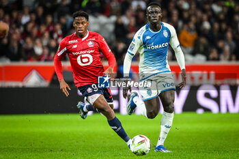 2023-10-29 - Jonathan DAVID of Lille and Krepin DIATTA of Monaco during the French championship Ligue 1 football match between Losc Lille and AS Monaco on October 29, 2023 at Pierre Mauroy stadium in Villeneuve-d'Ascq near Lille, France - FOOTBALL - FRENCH CHAMP - LILLE V MONACO - FRENCH LIGUE 1 - SOCCER