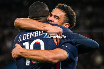 2023-11-03 - Warren ZAIRE-EMERY of PSG celebrate his goal with Ousmane DEMBELE of PSG during the French championship Ligue 1 football match between Paris Saint-Germain and Montpellier HSC on November 3, 2023 at Parc des Princes stadium in Paris, France - FOOTBALL - FRENCH CHAMP - PARIS SG V MONTPELLIER - FRENCH LIGUE 1 - SOCCER
