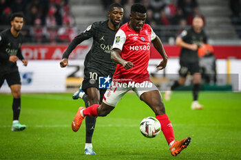 2023-11-11 - Ousmane DEMBELE of PSG and Azor MATUSIWA of Reims during the French championship Ligue 1 football match between Stade de Reims and Paris Saint-Germain on November 11, 2023 at Auguste Delaune stadium in Reims, France - FOOTBALL - FRENCH CHAMP - REIMS V PARIS SG - FRENCH LIGUE 1 - SOCCER