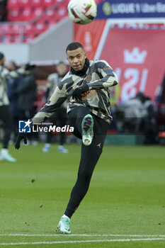 2023-11-11 - Kylian Mbappe of PSG warms up before the French championship Ligue 1 football match between Stade de Reims and Paris Saint-Germain on November 11, 2023 at Auguste Delaune stadium in Reims, France - FOOTBALL - FRENCH CHAMP - REIMS V PARIS SG - FRENCH LIGUE 1 - SOCCER