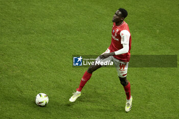 2023-11-11 - Joseph Okumu of Reims during the French championship Ligue 1 football match between Stade de Reims and Paris Saint-Germain on November 11, 2023 at Auguste Delaune stadium in Reims, France - FOOTBALL - FRENCH CHAMP - REIMS V PARIS SG - FRENCH LIGUE 1 - SOCCER