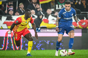 2023-11-12 - Deiver MACHADO of Lens and Jonathan CLAUSS of Marseille during the French championship Ligue 1 football match between RC Lens and Olympique de Marseille on November 12, 2023 at Bollaert-Delelis stadium in Lens, France - FOOTBALL - FRENCH CHAMP - LENS V MARSEILLE - FRENCH LIGUE 1 - SOCCER