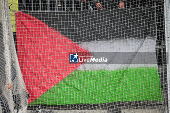 2023-11-12 - Flag of Palestine during the French championship Ligue 1 football match between RC Lens and Olympique de Marseille on November 12, 2023 at Bollaert-Delelis stadium in Lens, France - FOOTBALL - FRENCH CHAMP - LENS V MARSEILLE - FRENCH LIGUE 1 - SOCCER