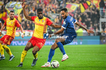 2023-11-12 - Kevin DANSO of Lens and Pierre-Emerick AUBAMEYANG of Marseille during the French championship Ligue 1 football match between RC Lens and Olympique de Marseille on November 12, 2023 at Bollaert-Delelis stadium in Lens, France - FOOTBALL - FRENCH CHAMP - LENS V MARSEILLE - FRENCH LIGUE 1 - SOCCER