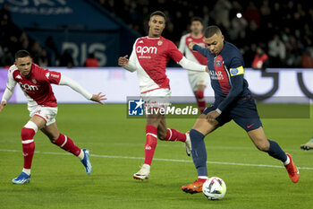 2023-11-24 - Kylian Mbappe of PSG, left Vanderson de Oliveira Campos, Ismail Jakobs of Monaco during the French championship Ligue 1 football match between Paris Saint-Germain and AS Monaco on November 24, 2023 at Parc des Princes stadium in Paris, France - FOOTBALL - FRENCH CHAMP - PARIS SG V MONACO - FRENCH LIGUE 1 - SOCCER
