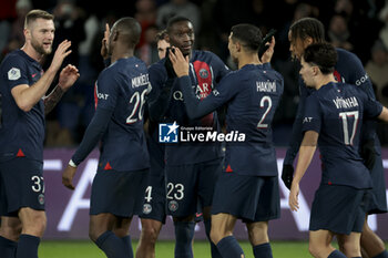 2023-11-24 - Randal Kolo Muani of PSG celebrates his goal with teammates during the French championship Ligue 1 football match between Paris Saint-Germain and AS Monaco on November 24, 2023 at Parc des Princes stadium in Paris, France - FOOTBALL - FRENCH CHAMP - PARIS SG V MONACO - FRENCH LIGUE 1 - SOCCER