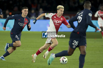 2023-11-24 - Aleksandr Golovin of Monaco, left Manuel Ugarte of PSG during the French championship Ligue 1 football match between Paris Saint-Germain and AS Monaco on November 24, 2023 at Parc des Princes stadium in Paris, France - FOOTBALL - FRENCH CHAMP - PARIS SG V MONACO - FRENCH LIGUE 1 - SOCCER