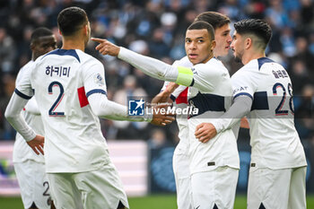 2023-12-03 - Kylian MBAPPE of PSG celebrate his goal with teammates during the French championship Ligue 1 football match between Le Havre AC and Paris Saint-Germain on December 3, 2023 at Oceane stadium in Le Havre, France - FOOTBALL - FRENCH CHAMP - LE HAVRE V PARIS SG - FRENCH LIGUE 1 - SOCCER