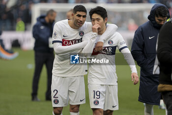 2023-12-03 - Achraf Hakimi and Lee Kang-in of PSG celebrate the victory following the French championship Ligue 1 football match between Le Havre AC and Paris Saint-Germain on December 3, 2023 at Oceane stadium in Le Havre, France - FOOTBALL - FRENCH CHAMP - LE HAVRE V PARIS SG - FRENCH LIGUE 1 - SOCCER