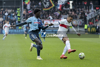 2023-12-03 - Kylian Mbappe of PSG, left Etienne Youte Kinkoue of Le Havre in action during the French championship Ligue 1 football match between Le Havre AC and Paris Saint-Germain on December 3, 2023 at Oceane stadium in Le Havre, France - FOOTBALL - FRENCH CHAMP - LE HAVRE V PARIS SG - FRENCH LIGUE 1 - SOCCER