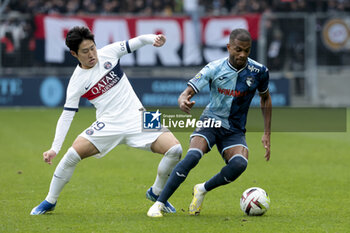 2023-12-03 - Lee Kang-in of PSG, Loic Nego of Le Havre during the French championship Ligue 1 football match between Le Havre AC and Paris Saint-Germain on December 3, 2023 at Oceane stadium in Le Havre, France - FOOTBALL - FRENCH CHAMP - LE HAVRE V PARIS SG - FRENCH LIGUE 1 - SOCCER