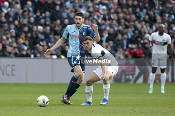 2023-12-03 - Gautier Lloris of Le Havre, Manuel Ugarte of PSG during the French championship Ligue 1 football match between Le Havre AC and Paris Saint-Germain on December 3, 2023 at Oceane stadium in Le Havre, France - FOOTBALL - FRENCH CHAMP - LE HAVRE V PARIS SG - FRENCH LIGUE 1 - SOCCER
