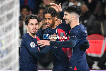 2023-12-09 - Bradley BARCOLA of PSG celebrate his goal with Vitor MACHADO FERREIRA (Vitinha) of PSG and Carlos SOLER of PSG during the French championship Ligue 1 football match between Paris Saint-Germain and FC Nantes on December 9, 2023 at Parc des Princes stadium in Paris, France - FOOTBALL - FRENCH CHAMP - PARIS SG V NANTES - FRENCH LIGUE 1 - SOCCER