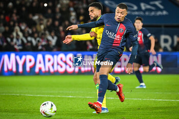 2023-12-09 - Jean-Charles CASTELLETTO of Nantes and Kylian MBAPPE of PSG during the French championship Ligue 1 football match between Paris Saint-Germain and FC Nantes on December 9, 2023 at Parc des Princes stadium in Paris, France - FOOTBALL - FRENCH CHAMP - PARIS SG V NANTES - FRENCH LIGUE 1 - SOCCER