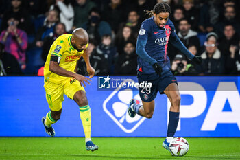 2023-12-09 - Marcus COCO of Nantes and Bradley BARCOLA of PSG during the French championship Ligue 1 football match between Paris Saint-Germain and FC Nantes on December 9, 2023 at Parc des Princes stadium in Paris, France - FOOTBALL - FRENCH CHAMP - PARIS SG V NANTES - FRENCH LIGUE 1 - SOCCER