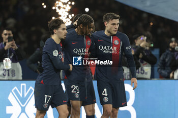2023-12-09 - Bradley Barcola of PSG celebrates his goal with Vitinha, Manuel Ugarte of PSG during the French championship Ligue 1 football match between Paris Saint-Germain and FC Nantes on December 9, 2023 at Parc des Princes stadium in Paris, France - FOOTBALL - FRENCH CHAMP - PARIS SG V NANTES - FRENCH LIGUE 1 - SOCCER