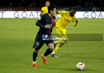 2023-12-09 - Lee Kang-in of PSG, Jean-Kevin Duverne of Nantes during the French championship Ligue 1 football match between Paris Saint-Germain and FC Nantes on December 9, 2023 at Parc des Princes stadium in Paris, France - FOOTBALL - FRENCH CHAMP - PARIS SG V NANTES - FRENCH LIGUE 1 - SOCCER