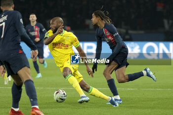 2023-12-09 - Bradley Barcola of PSG, left Marcus Coco of Nantes during the French championship Ligue 1 football match between Paris Saint-Germain and FC Nantes on December 9, 2023 at Parc des Princes stadium in Paris, France - FOOTBALL - FRENCH CHAMP - PARIS SG V NANTES - FRENCH LIGUE 1 - SOCCER