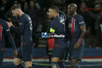 2023-12-09 - Randal Kolo Muani of PSG celebrates his goal with Milan Skriniar, Kylian Mbappe, Danilo Pereira of PSG during the French championship Ligue 1 football match between Paris Saint-Germain and FC Nantes on December 9, 2023 at Parc des Princes stadium in Paris, France - FOOTBALL - FRENCH CHAMP - PARIS SG V NANTES - FRENCH LIGUE 1 - SOCCER