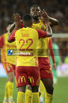 2023-12-16 - Wesley Said of Lens celebrates his goal with Kevin Danso of Lens during the French championship Ligue 1 football match between RC Lens ans Stade de Reims on December 16, 2023 at Bollaert-Delelis stadium in Lens, France - FOOTBALL - FRENCH CHAMP - LENS V REIMS - FRENCH LIGUE 1 - SOCCER