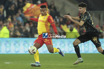2023-12-16 - Oscar Cortes of Lens, Thibault De Smet of Reims during the French championship Ligue 1 football match between RC Lens ans Stade de Reims on December 16, 2023 at Bollaert-Delelis stadium in Lens, France - FOOTBALL - FRENCH CHAMP - LENS V REIMS - FRENCH LIGUE 1 - SOCCER