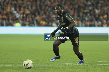 2023-12-16 - Joseph Okumu of Reims during the French championship Ligue 1 football match between RC Lens ans Stade de Reims on December 16, 2023 at Bollaert-Delelis stadium in Lens, France - FOOTBALL - FRENCH CHAMP - LENS V REIMS - FRENCH LIGUE 1 - SOCCER