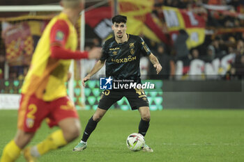 2023-12-16 - Thibault De Smet of Reims during the French championship Ligue 1 football match between RC Lens ans Stade de Reims on December 16, 2023 at Bollaert-Delelis stadium in Lens, France - FOOTBALL - FRENCH CHAMP - LENS V REIMS - FRENCH LIGUE 1 - SOCCER