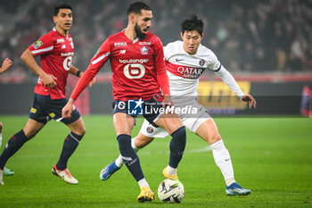 2023-12-17 - Nabil BENTALEB of Lille and Lee KANG-IN of PSG during the French championship Ligue 1 football match between Losc Lille and Paris Saint-Germain on December 17, 2023 at Pierre Mauroy stadium in Villeneuve-d'Ascq near Lille, France - FOOTBALL - FRENCH CHAMP - LILLE V PARIS SG - FRENCH LIGUE 1 - SOCCER