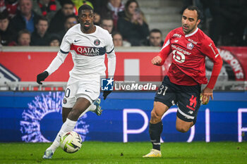 2023-12-17 - Ousmane DEMBELE of PSG and Ismaily GONCALVES DOS SANTOS of Lille during the French championship Ligue 1 football match between Losc Lille and Paris Saint-Germain on December 17, 2023 at Pierre Mauroy stadium in Villeneuve-d'Ascq near Lille, France - FOOTBALL - FRENCH CHAMP - LILLE V PARIS SG - FRENCH LIGUE 1 - SOCCER