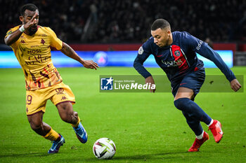 2023-12-20 - Habib MAIGA of Metz and Kylian MBAPPE of PSG during the French championship Ligue 1 football match between Paris Saint-Germain and FC Metz on December 20, 2023 at Parc des Princes stadium in Paris, France - FOOTBALL - FRENCH CHAMP - PARIS SG V METZ - FRENCH LIGUE 1 - SOCCER
