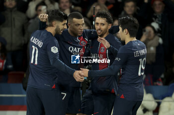 2023-12-20 - Kylian Mbappe of PSG celebrates his second goal with Marco Asensio, Marquinhos, Lee Kang-in during the French championship Ligue 1 football match between Paris Saint-Germain and FC Metz on December 20, 2023 at Parc des Princes stadium in Paris, France - FOOTBALL - FRENCH CHAMP - PARIS SG V METZ - FRENCH LIGUE 1 - SOCCER