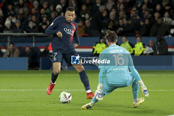 2023-12-20 - Kylian Mbappe of PSG, Goalkeeper of Metz Alexandre Oukidja during the French championship Ligue 1 football match between Paris Saint-Germain and FC Metz on December 20, 2023 at Parc des Princes stadium in Paris, France - FOOTBALL - FRENCH CHAMP - PARIS SG V METZ - FRENCH LIGUE 1 - SOCCER