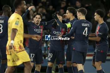 2023-12-20 - Vitinha of PSG celebrates his goal with Marquinhos and teammates during the French championship Ligue 1 football match between Paris Saint-Germain and FC Metz on December 20, 2023 at Parc des Princes stadium in Paris, France - FOOTBALL - FRENCH CHAMP - PARIS SG V METZ - FRENCH LIGUE 1 - SOCCER