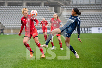 2023-02-04 - Maria Diaz of Dijon FCO and Eseosa Aigbogun of Paris FC fight for the ball during the Women's French championship, D1 Arkema football match between Paris FC and Dijon FCO on February 4, 2023 at Sebastien Charlety stadium in Paris, France - FOOTBALL - WOMEN'S FRENCH CHAMP - PARIS FC V DIJON - FRENCH WOMEN DIVISION 1 - SOCCER