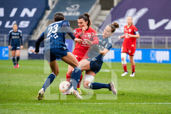 2023-02-04 - Eseosa Aigbogun of Paris FC, Rose Lavaud of Dijon FCO and Thea Greboval of Paris FC fight for the ball during the Women's French championship, D1 Arkema football match between Paris FC and Dijon FCO on February 4, 2023 at Sebastien Charlety stadium in Paris, France - FOOTBALL - WOMEN'S FRENCH CHAMP - PARIS FC V DIJON - FRENCH WOMEN DIVISION 1 - SOCCER