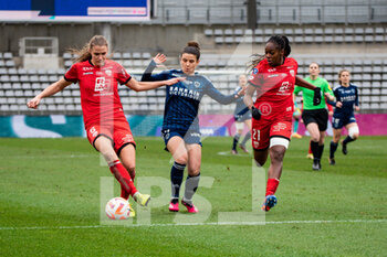 2023-02-04 - Malgorzata Grec of Dijon FCO, Mathilde Bourdieu of Paris FC and Kysha Sylla of Dijon FCO fight for the ball during the Women's French championship, D1 Arkema football match between Paris FC and Dijon FCO on February 4, 2023 at Sebastien Charlety stadium in Paris, France - FOOTBALL - WOMEN'S FRENCH CHAMP - PARIS FC V DIJON - FRENCH WOMEN DIVISION 1 - SOCCER
