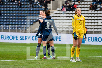 2023-02-04 - Mathilde Bourdieu of Paris FC celebrates after scoring with Louise Fleury of Paris FC during the Women's French championship, D1 Arkema football match between Paris FC and Dijon FCO on February 4, 2023 at Sebastien Charlety stadium in Paris, France - FOOTBALL - WOMEN'S FRENCH CHAMP - PARIS FC V DIJON - FRENCH WOMEN DIVISION 1 - SOCCER