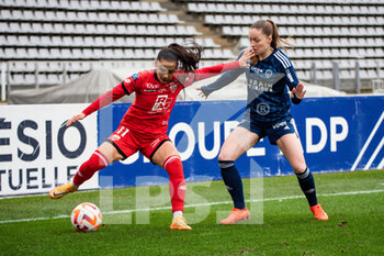 2023-02-04 - Meriame Terchoun of Dijon FCO and Margaux Le Mouel of Paris FC fight for the ball during the Women's French championship, D1 Arkema football match between Paris FC and Dijon FCO on February 4, 2023 at Sebastien Charlety stadium in Paris, France - FOOTBALL - WOMEN'S FRENCH CHAMP - PARIS FC V DIJON - FRENCH WOMEN DIVISION 1 - SOCCER